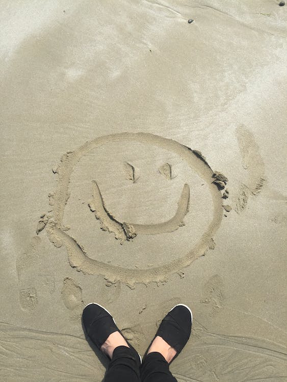 Smiley im Sand